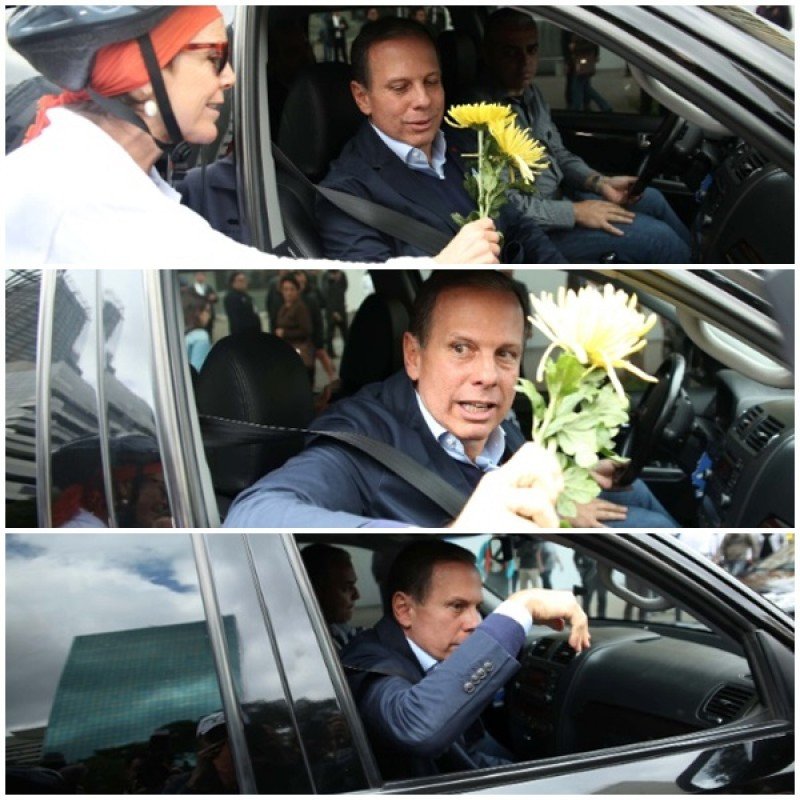 Doria recebe flores por 'mortos nas Marginais' e as joga pela janela de carro